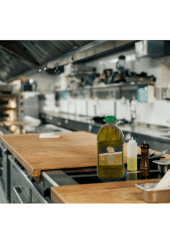 Reinos de Taifas Extra Virgin olive oil 5L in a restaurant kitchen table